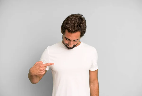 Young Crazy Man Smiling Cheerfully Casually Looking Downwards Pointing Chest — Stock Photo, Image