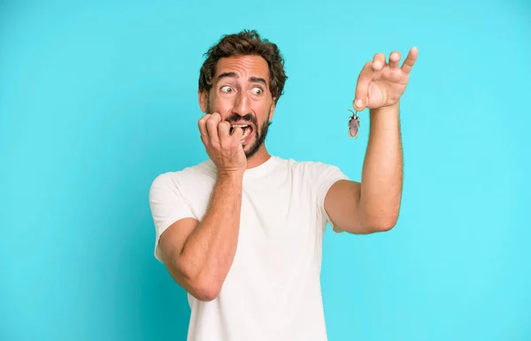 Young Crazy Bearded Expressive Man Holding Insect Fingers — Stock Photo, Image