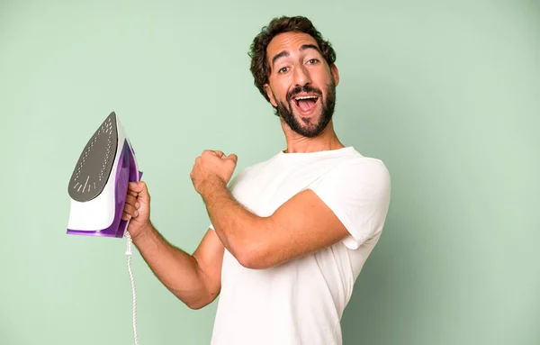 Young Crazy Bearded Expressive Man Clothes Iron Housekeeper Concept — Stock Photo, Image