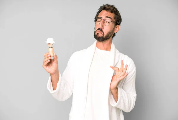 Young Crazy Bearded Expressive Man Wearing Bathrobe Shaving Beard Concept — Stock Photo, Image