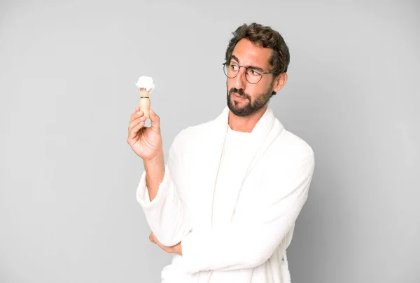 Young Crazy Bearded Expressive Man Wearing Bathrobe Shaving Beard Concept — Stock Photo, Image