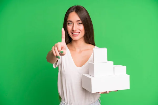 Young Pretty Woman Smiling Proudly Confidently Making Number One Empty — Stock Photo, Image