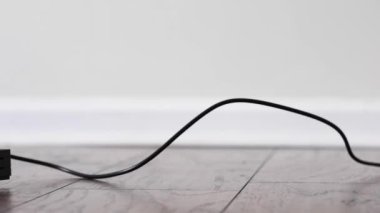 Sliding in front of wireless hotspot for Helium cryptocurrency token mining with stock over the air antenna placed on hardwood floor