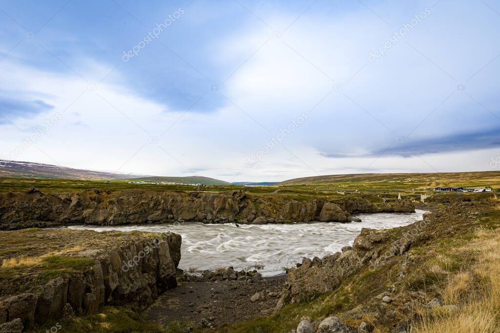 Flow of water in the river Skjlfandafljt near Goafoss Waterfall close to the second largest city in Iceland, Akureyri.