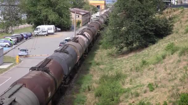 Moving Train Liquid Chemical Transportation Cars Slowly Going Next Parking — стоковое видео