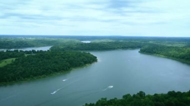 Recreational boats speeding on the waters of Taylorsville lake in Central Kentucky