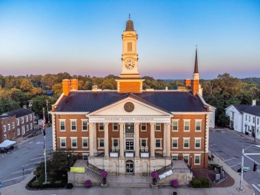 Woodford county courthouse in downtown Versailles, Kentucky lit by the rising sun.