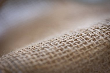 Yaratıcı bir tasarım arka planı olarak kullanılabilecek gevşek kenevir kumaşının dalgaları ve yapısı