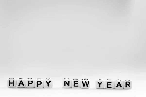 Text Happy New Year Assembled Letters Small Plastic Cubes Placed — Stock Photo, Image