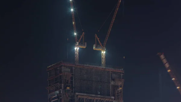 Cranes Working Modern Constraction Site Works New Skyscraper Timelapse Night — Stock Photo, Image