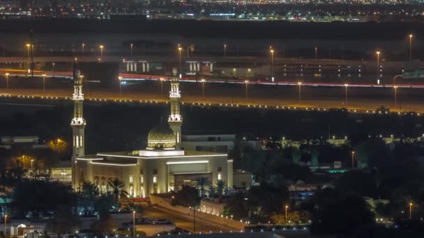 Veduta aerea della moschea e del quartiere Deira su un timelapse notte sfondo. Dubai, Emirati Arabi Uniti — Video Stock