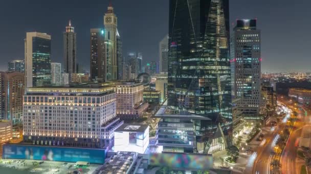 Dubai International Financial district aerial night timelapse. Panoramic view of business and financial office towers. — Stock Video