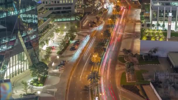 Skyline vista del traffico su Al Saada strada vicino DIFC quartiere notte timelapse a Dubai, Emirati Arabi Uniti. — Video Stock