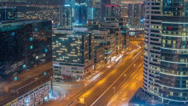 Dubai Edificios Oficinas Bahía Negocios Noche Aérea Timelapse Con Tráfico —  Fotos de Stock