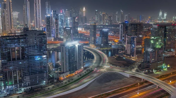 Skyline Con Arquitectura Moderna Bahía Negocios Dubai Torres Iluminadas Timelapse —  Fotos de Stock