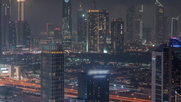 Sorok Felhőkarcolók Pénzügyi Negyedében Dubai Légi Éjszakai Időbeosztás Panorámás Kilátás — Stock Fotó