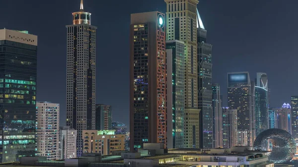Világító Felhőkarcolók Dubai Nemzetközi Pénzügyi Körzet Éjszakai Időzónájában Légi Kilátás — Stock Fotó
