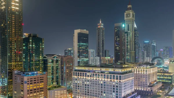 Dubai International Financial District 공중에서 사무용 타워가 보인다 조명을 시설을 — 스톡 사진