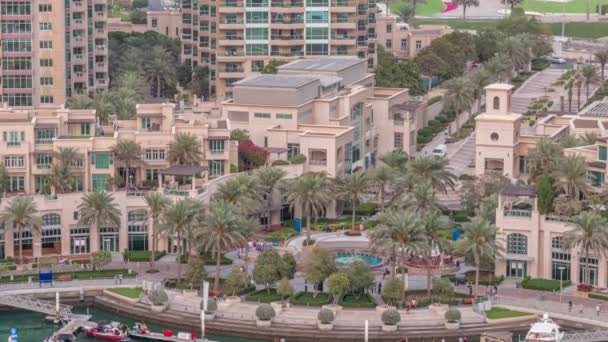 Picturesque fountain on Dubai Marina promenade aerial day to night timelapse — Stock Video