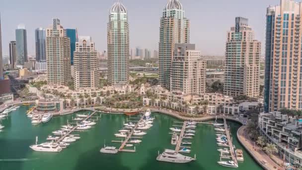 Luxury yacht bay in the city aerial timelapse in Dubai marina — Stockvideo