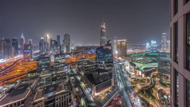 Futuristic Dubai Downtown and finansial district skyline aerial night timelapse. — Stock Video