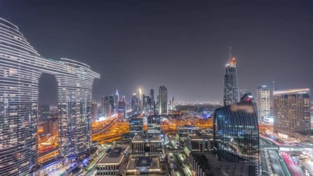 Futuristic Dubai Downtown and finansial district skyline aerial all night timelapse. — Stock Video