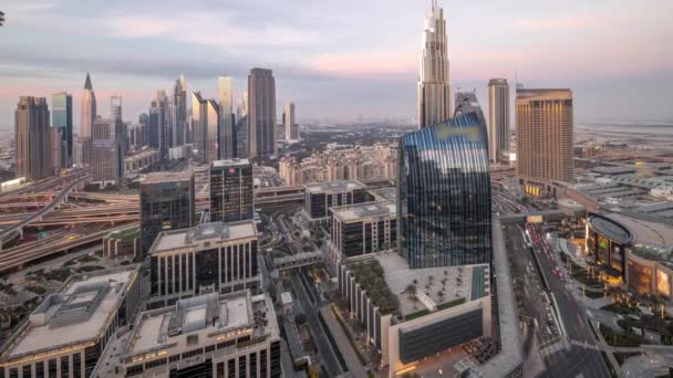 Futuristic Dubai Downtown and finansial district skyline aerial day to night timelapse. — Stockvideo