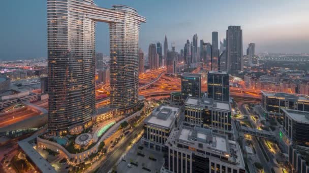 Futuristic Dubai Downtown and finansial district skyline aerial night to day timelapse. — Vídeo de Stock