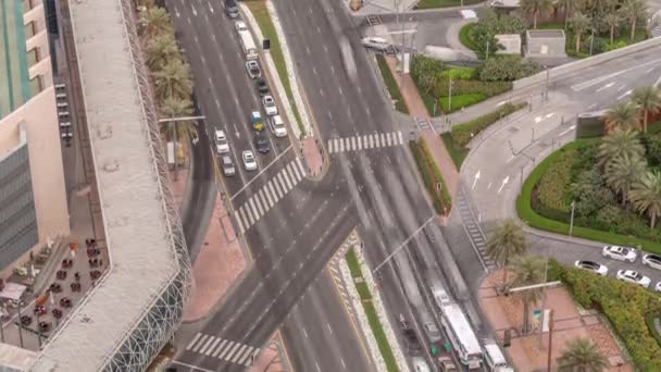 Overhead view of transport on a busy road in Dubai downtown aerial timelapse, United Arab Emirates — Stockvideo