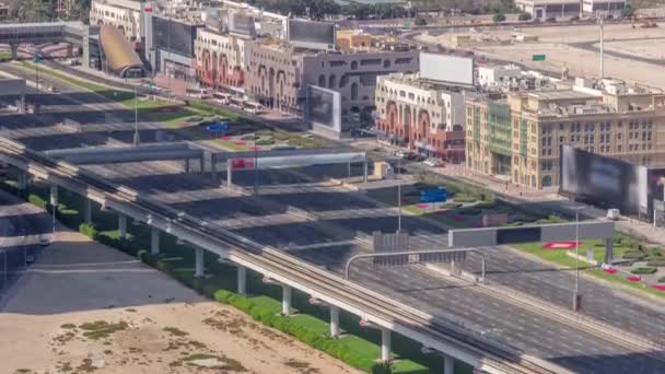 Overhead view of transport on a busy road in Dubai downtown aerial timelapse, United Arab Emirates — Stock Video