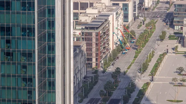 Şehir Yürüyüşü zaman çizelgesi yukarıdan, Dubai şehir merkezindeki yeni şehir alanı. İnşaatı yapılan konut binaları cephe ve alışveriş bölgesi manzarası üzerine çalışır.