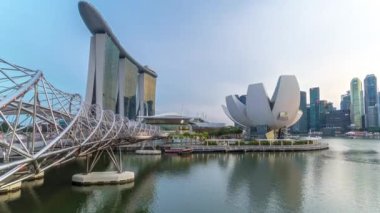View of The Helix Bridge in Singapore day to night timelapse.