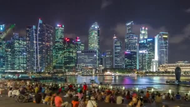 Light and Water Show along promenade in front of Marina Bay Sands timelapse hyperlapse. — Stock Video