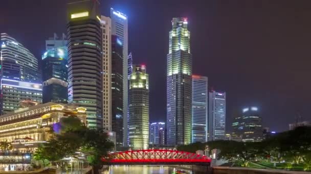 Singapore business district skyscrapers in the night time with water reflections timelapse hyperlapse — стоковое видео