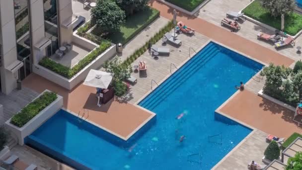 Rooftop swimming pool viewed from above timelapse, Aerial top view — Stok video