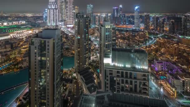 Aerial panoramic view of a big futuristic city night timelapse. Business bay and Downtown — Wideo stockowe