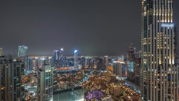 Aerial panoramic view of a big futuristic city night timelapse. Business bay and Downtown — Stock video