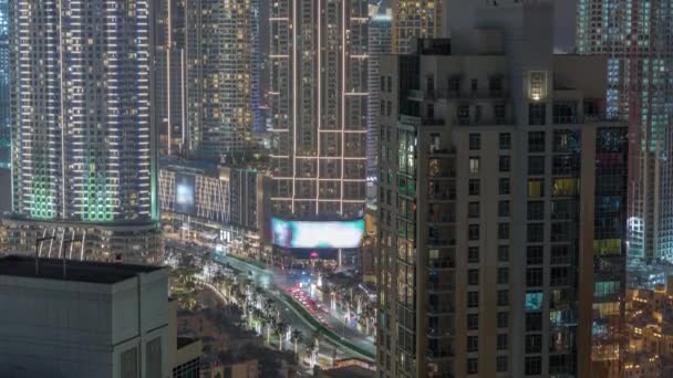 Aerial view of a big futuristic city night timelapse. Business bay and Downtown — Stok video