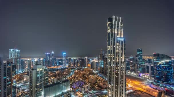 Aerial panoramic view of a big futuristic city night timelapse. Business bay and Downtown — 비디오