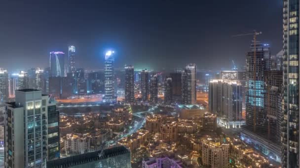 Aerial panoramic view of a big futuristic city night timelapse. Business bay and Downtown — Stock Video