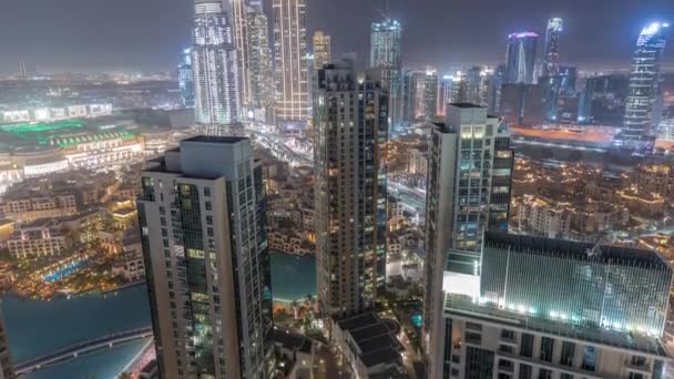 Aerial panoramic view of a big futuristic city night timelapse. Business bay and Downtown — Vídeo de Stock