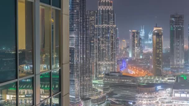 Dubai downtown with modern futuristic architecture aerial night timelapse — Stock Video