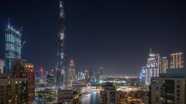 Dubai Downtown cityscape com arranha-céus mais altos em torno da timelapse da noite aérea. — Vídeo de Stock