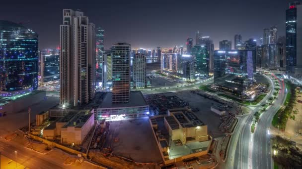 Business Bay Dubai ουρανοξύστες με νερό κανάλι κεραία όλη τη νύχτα timelapse. — Αρχείο Βίντεο