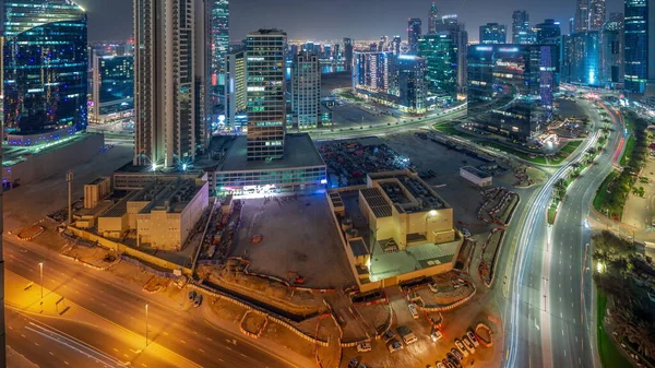 Business Bay Dubai Megvilágított Felhőkarcolók Vízcsatornával Antenna Éjszakai Panorámás Timelapse — Stock Fotó