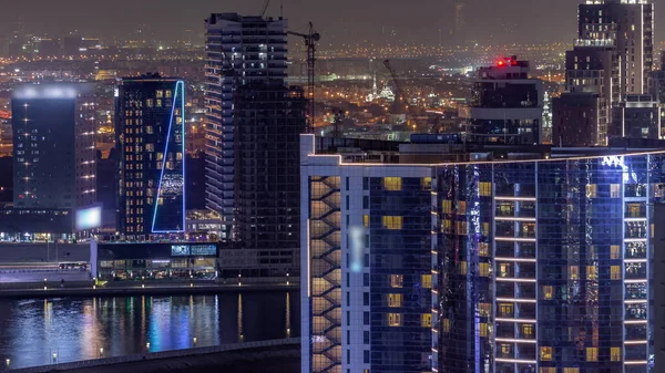 Business Bay Dubaj Osvětlené Mrakodrapy Staveniště Vodní Kanál Letecké Noci — Stock fotografie