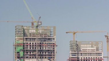 Vinçler, yeni gökdelenlerin zaman çizelgelerinin soyutlama sahasında çalışıyorlar