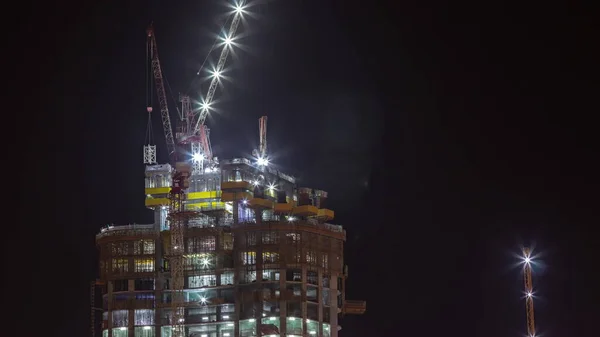 Építési Folyamat Egy Lakóépület Komplex Légi Éjszakai Időintervallum Sok Toronydaru — Stock Fotó