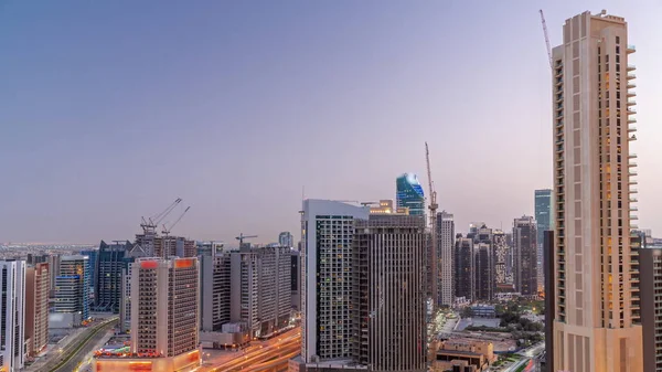 Rascacielos Bahía Negocios Dubai Día Aéreo Noche Transición Panorámica Timelapse —  Fotos de Stock