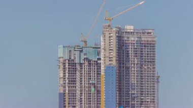 Vinçler, yeni gökdelenlerin zaman çizelgelerinin soyutlama sahasında çalışıyorlar